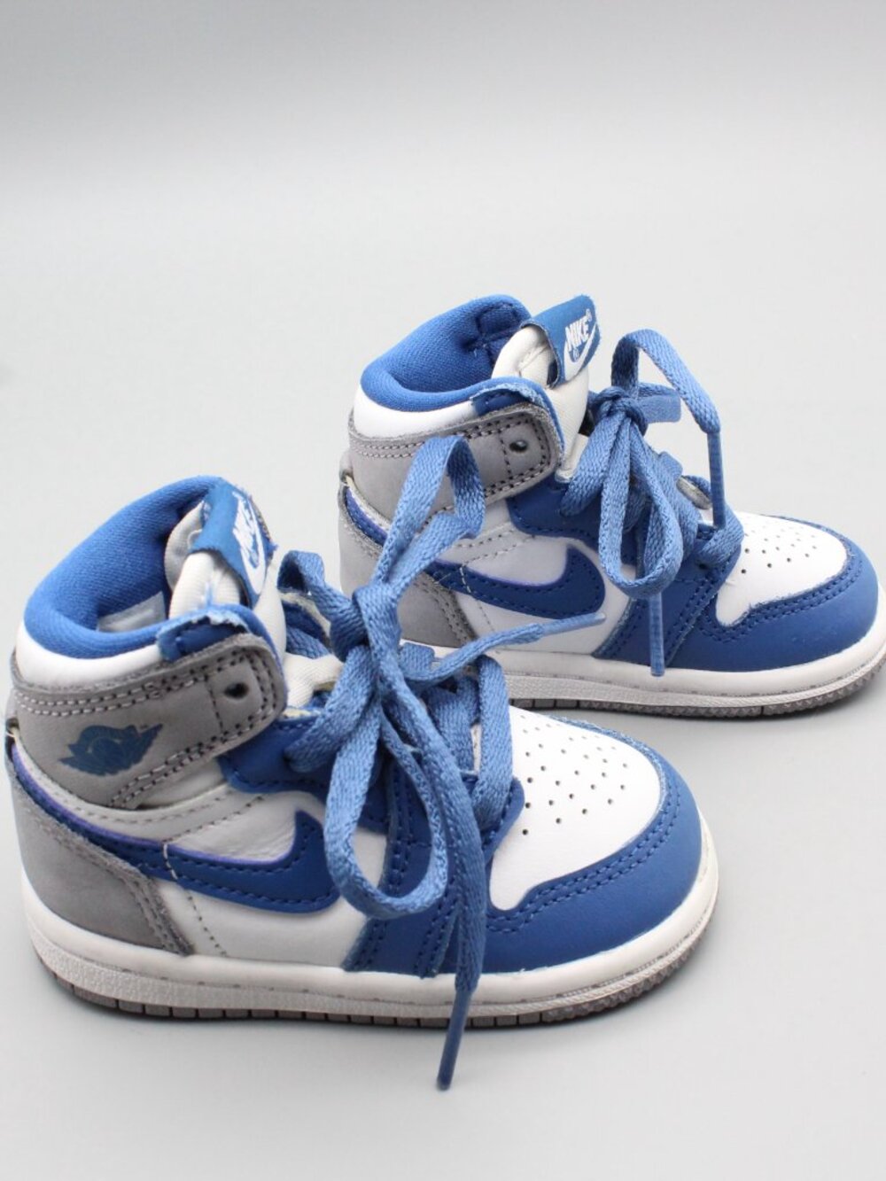 Nike Force 1 Low toddler shoes in all white, size 4C, with the original box. Thi